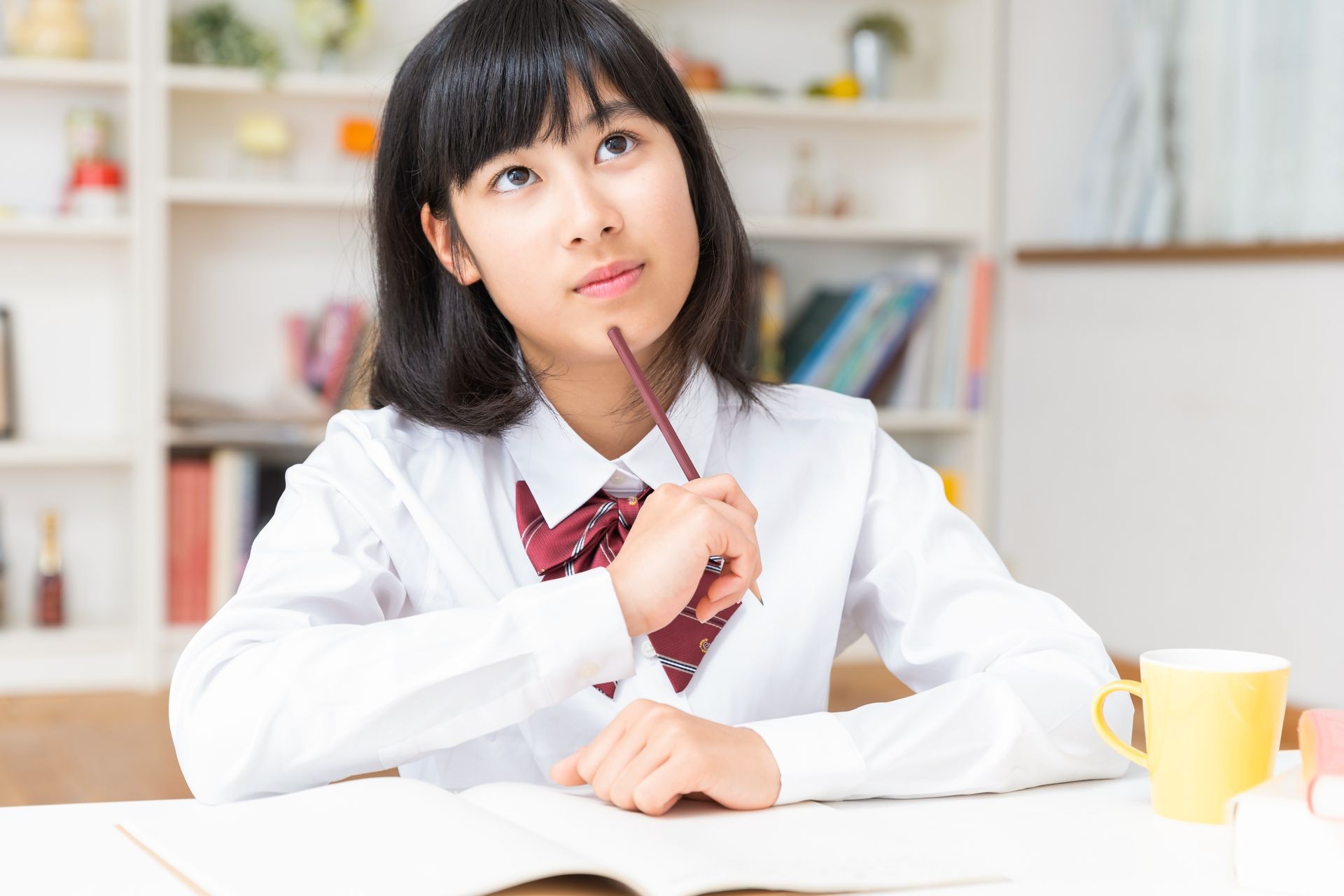 asian girl in a uniform who study